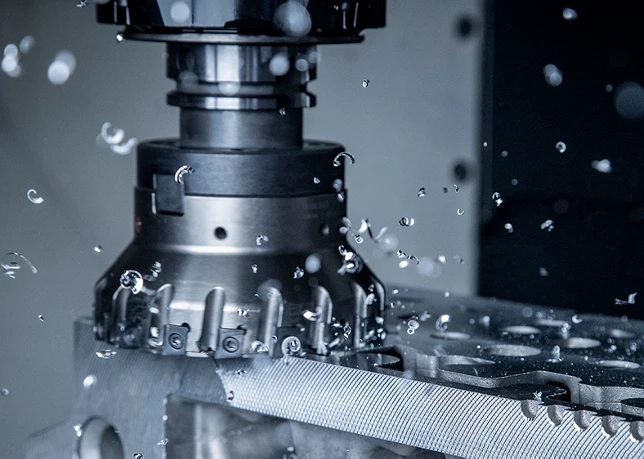 Rock Drill Fabrication machinist operating CNC mill